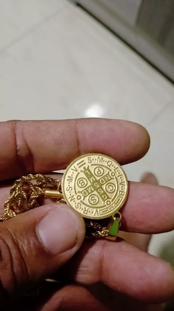Detalhes da medalha recebida por Roberto